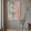 A modern living room with a beige sectional sofa, a glass staircase, and a Zen-themed painting from the Japandi Wall Art Set. The artwork features a bonsai tree and rocks, adding to the bright, serene atmosphere.
