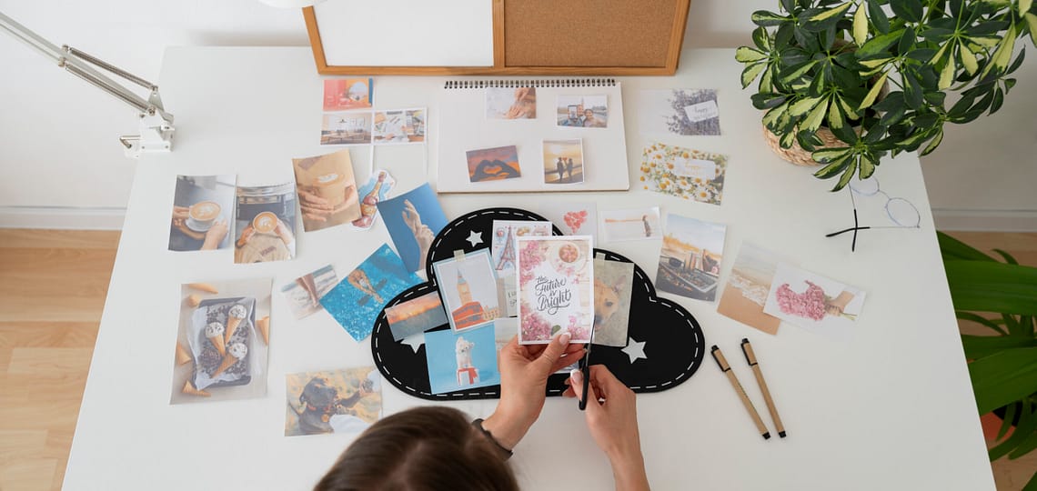 high-angle-woman-holding-photos