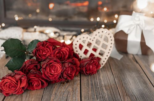 Floral Arrangement Ideas for Valentine's Day festive-background-valentine39s-day-with-bouquet-red-roses-copy-space