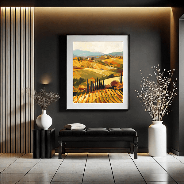 Tuscany travel art in a vertical 3:4 ratio frame hangs in a modern black-and-white hallway. The frame contrasts with the sleek decor, which features a bench, white vase, and soft lighting, enhancing the warm hues of the artwork.