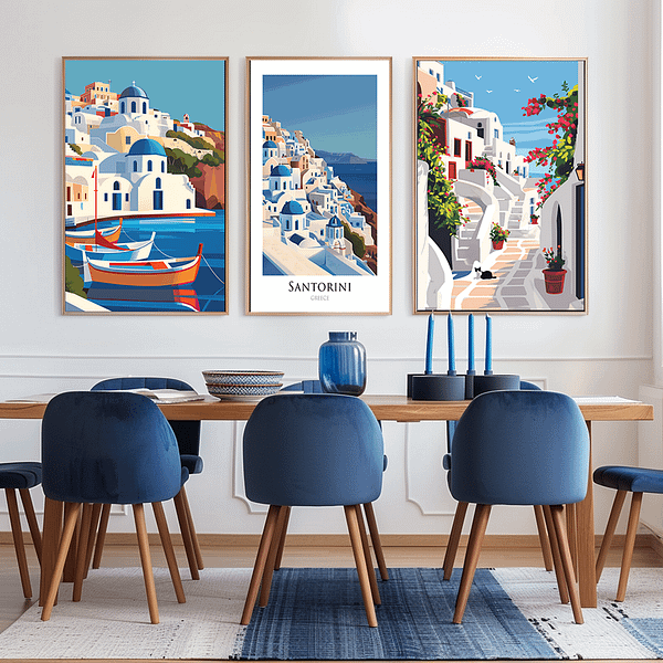 Three framed posters of Santorini, Greece, displayed in a dining area. The posters feature vivid scenes of boats, domed churches, and picturesque streets, complementing the dining room's blue accents and light wooden furniture.