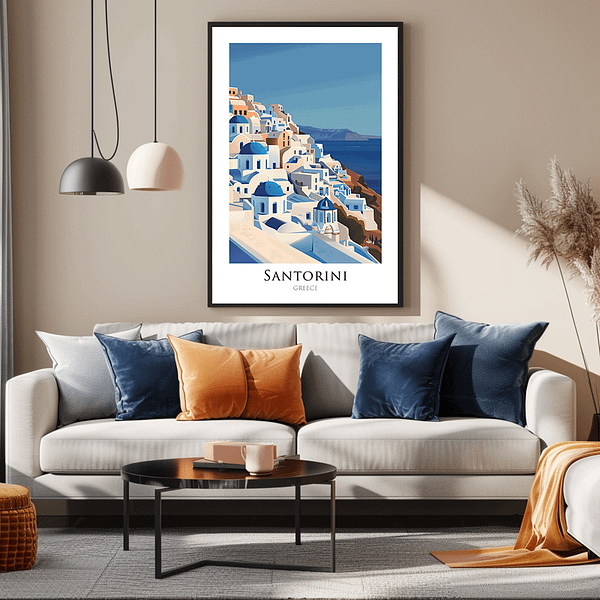 A large framed poster of Santorini's iconic blue-domed churches and white buildings, hung above a living room sofa. The room is decorated in a modern style with blue and orange cushions, complementing the coastal theme of the artwork.