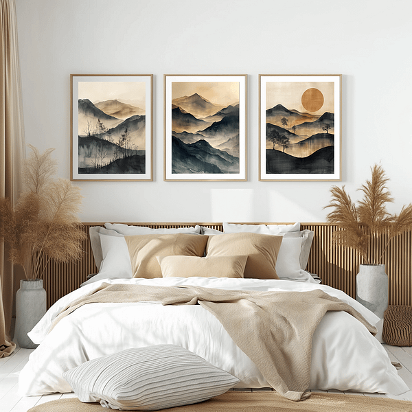 A calm bedroom with three minimalist Japanese landscape prints. Soft beige and blue mountains create a peaceful atmosphere, complementing the neutral bedding and decor.