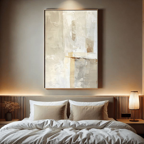 A vertical Minimalist Japanese Digital Wall Art piece with abstract shapes and a muted beige color palette hangs above a modern, minimalist bed. The neutral tones of the art blend seamlessly with the warm, soft lighting and natural wood elements in the room, creating a peaceful and inviting sleep sanctuary.