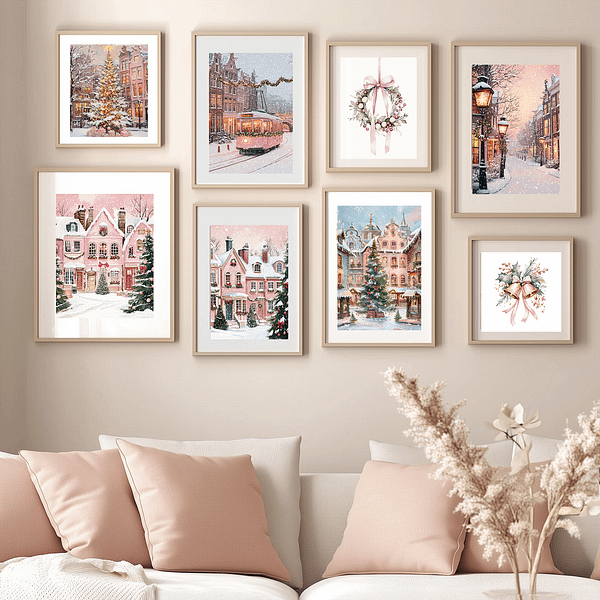 A pink, beige, and white minimalist living room with 8 light wooden-framed Christmas prints featuring romantic pink tones on the wall.