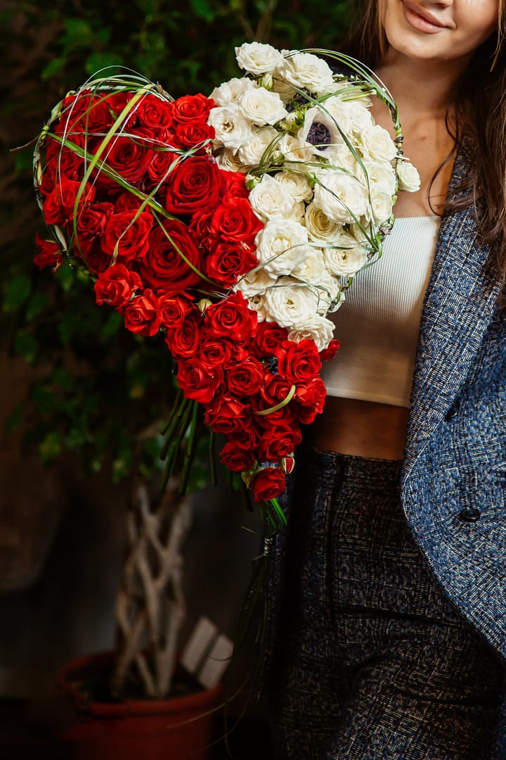 Floral Arrangement Ideas for Valentine's Day side view heart shaped bouquet of white and red roses