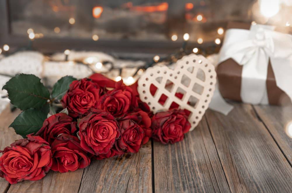 Floral Arrangement Ideas for Valentine's Day festive-background-valentine39s-day-with-bouquet-red-roses-copy-space